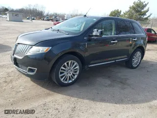 2011 Lincoln MKX with VIN 2LMDJ8JK4BBJ04408, listed as a IAAI auction lot 41772486 with 128,544 mi miles. Bid and sale history available at carsss.com. Image 2.