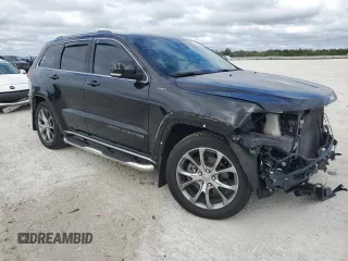 2020 Jeep Grand Cherokee Summit with VIN 1C4RJFJT1LC180477, listed as a Copart auction lot 84943334 with 33,870 mi miles and Salvage title. Bid and sale history available at DreamBid. Image 4.