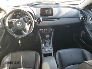 2019 Mazda CX-3 Grand Touring with VIN JM1DKFD77K0447529, listed as a Copart auction lot 43562565 with 57,321 mi miles and Salvage Title. Bid and sale history available at DreamBid. Image 8.