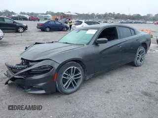 2019 Dodge Charger SXT with VIN 2C3CDXJG1KH730489, listed as a IAAI auction lot 41189171 with 39,514 mi miles and . Bid and sale history available at DreamBid. Image 17.