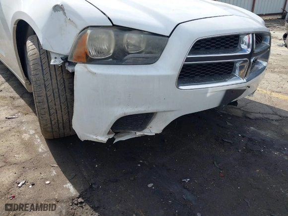 2012 Dodge Charger SE with VIN 2C3CDXBG8CH261739, listed as a IAAI auction lot 41527304 with 104,656 mi miles. Bid and sale history available at carsss.com. Image 6.