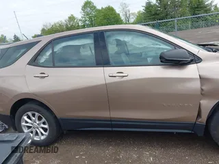 2018 Chevrolet Equinox LS z VIN 3GNAXHEV8JL348269, wystawiony jako IAAI lot #42178337 z przebiegiem 94 675 mil mil oraz . Historia ofert i sprzedaży dostępna na DreamBid. Obrazek 13.