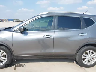 2016 Nissan Rogue S with VIN JN8AT2MT2GW025523, listed as a IAAI auction lot 41960371 with 73,965 mi miles and . Bid and sale history available at DreamBid. Image 14.