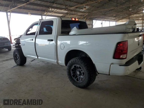 2018 Ram 1500 Tradesman with VIN 1C6RR6KGXJS219491, listed as a Copart auction lot 52093895 with 212,925 mi miles and Salvage title. Bid and sale history available at DreamBid. Image 2.