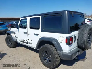 2018 Jeep Wrangler Unlimited Sport S with VIN 1C4HJXDG0JW140869, listed as a IAAI auction lot 41623256 with 112,197 mi miles. Bid and sale history available at carsss.com. Image 3.