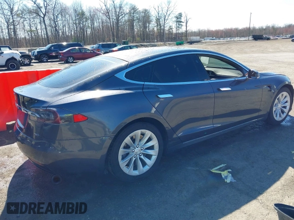 2017 Tesla Model S 100D with VIN 5YJSA1E22HF210635, listed as a IAAI auction lot 41854125 with 112,323 mi miles. Bid and sale history available at carsss.com. Image 4.