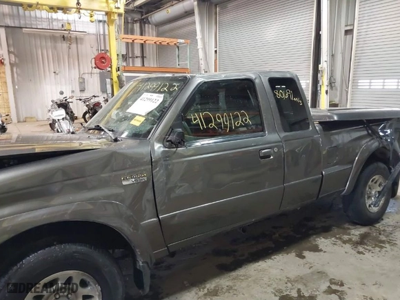 2005 Mazda B-Series 2WD Truck with VIN 4F4YR46U35PM04233, listed as a IAAI auction lot 41299122 with 80,691 mi miles. Bid and sale history available at carsss.com. Image 12.