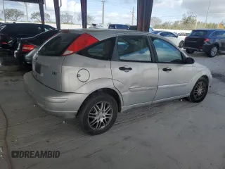 2004 Ford Focus ZX5 z VIN 3FAFP37394R122388, wystawiony jako Copart lot #45163225 z przebiegiem 259 554 mil mil oraz Czysty tytuł • Clean title. Historia ofert i sprzedaży dostępna na DreamBid. Obrazek 3.