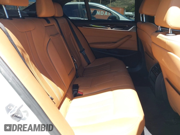 2019 BMW 5 Series 530e with VIN WBAJA9C53KB391999, listed as a IAAI auction lot 42311824 with 79,196 mi miles and . Bid and sale history available at DreamBid. Image 8.