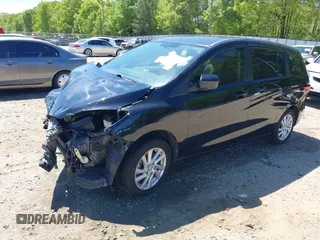 2012 Mazda 5 Sport with VIN JM1CW2BL4C0104669, listed as a IAAI auction lot 42048877 with 115,660 mi miles and . Bid and sale history available at DreamBid. Image 2.