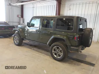 2021 Jeep Wrangler Unlimited Sahara z VIN 1C4HJXEN2MW592565, wystawiony jako IAAI lot #41956072 z przebiegiem 95 504 mil mil oraz . Historia ofert i sprzedaży dostępna na DreamBid. Obrazek 3.