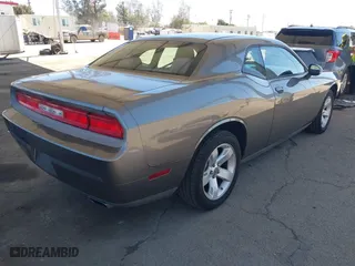 2011 Dodge Challenger with VIN 2B3CJ4DG0BH515573, listed as a IAAI auction lot 41861915 with 133,199 mi miles. Bid and sale history available at carsss.com. Image 4.