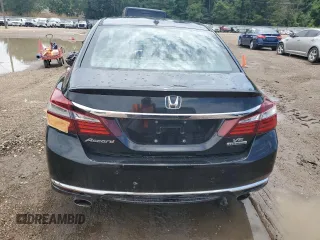 2016 Honda Accord Touring z VIN 1HGCR3F90GA023231, wystawiony jako Copart lot #63953765 z przebiegiem 167 506 mil mil oraz Czysty tytuł • Clean title. Historia ofert i sprzedaży dostępna na DreamBid. Obrazek 6.