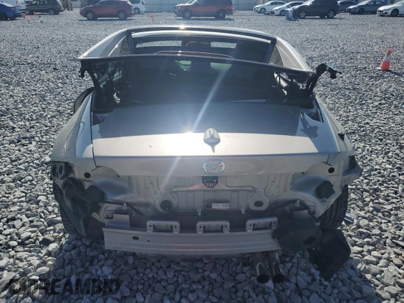2023 Mazda MX-5 Miata Grand Touring z VIN JM1NDAM70P0551336, wystawiony jako Copart lot #54984385 z przebiegiem 10 948 mil mil oraz Szkoda całkowita • Salvage title. Historia ofert i sprzedaży dostępna na DreamBid. Obrazek 6.