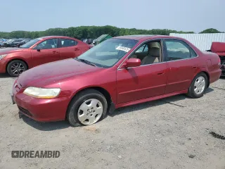 2001 Honda Accord EX z VIN 1HGCG165X1A073004, wystawiony jako Copart lot #59998525 z przebiegiem 71 632 mil mil oraz Czysty tytuł • Clean title. Historia ofert i sprzedaży dostępna na DreamBid. Obrazek 1.