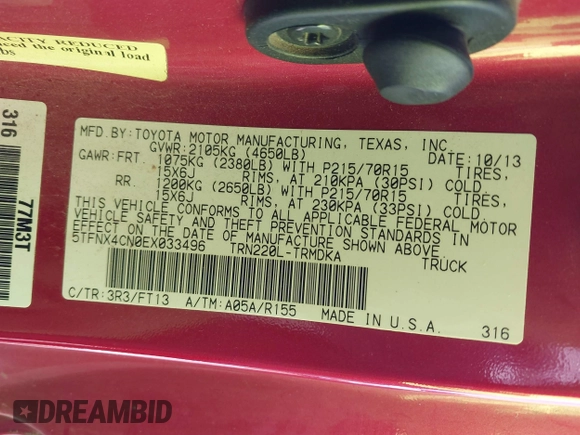 2014 Toyota Tacoma with VIN 5TFNX4CN0EX033496, listed as a IAAI auction lot 41388678 with 190,596 mi miles and . Bid and sale history available at DreamBid. Image 9.