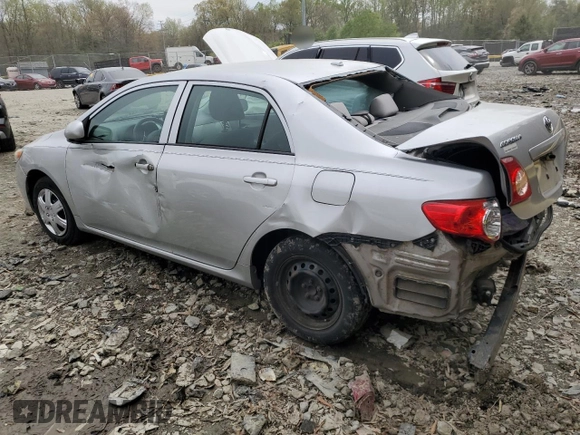 2009 Toyota Corolla with VIN 1NXBU40E89Z031322, listed as a Copart auction lot 52397465 with 198,046 mi miles and Salvage Title. Bid and sale history available at carsss.com. Image 2.