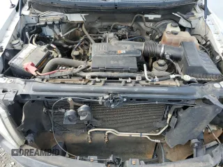 2010 Ford F-150 XL with VIN 1FTMF1CW4AKB46235, listed as a Copart auction lot 56931335 with 117,402 mi miles and Salvage title. Bid and sale history available at DreamBid. Image 11.