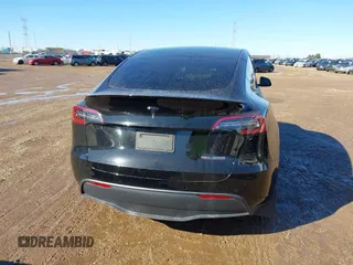2022 Tesla Model Y Performance with VIN 7SAYGDEFXNF313636, listed as a IAAI auction lot 41660019 with 30,258 mi miles and . Bid and sale history available at DreamBid. Image 17.