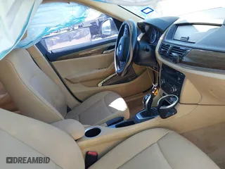 2015 BMW X1 sDrive28i with VIN WBAVM1C51FVZ94433, listed as a IAAI auction lot 41425205 with 148,346 mi miles. Bid and sale history available at carsss.com. Image 5.