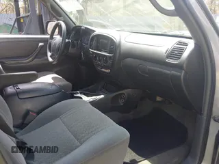 2004 Toyota Tundra SR5 with VIN 5TBDT44174S434897, listed as a IAAI auction lot 42128806 with 218,054 mi miles and . Bid and sale history available at DreamBid. Image 5.