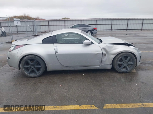 2003 Nissan 350Z Touring z VIN JN1AZ34E43T014247, wystawiony jako IAAI lot #42120812 z przebiegiem 112 263 mil mil oraz . Historia ofert i sprzedaży dostępna na DreamBid. Obrazek 13.
