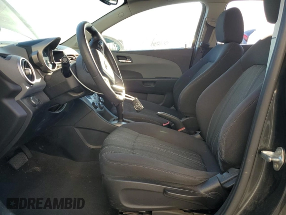 2014 Chevrolet Sonic LT with VIN 1G1JC5SH7E4220059, listed as a Copart auction lot 49877765 with 136,896 mi miles and Salvage Title. Bid and sale history available at DreamBid. Image 7.