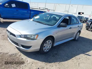 2010 Mitsubishi Lancer DE with VIN JA32U1FU4AU015574, listed as a IAAI auction lot 41770332 with 125,458 mi miles. Bid and sale history available at carsss.com. Image 16.
