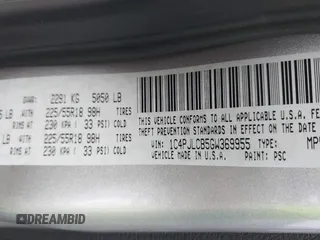 2016 Jeep Cherokee Latitude with VIN 1C4PJLCB5GW369955, listed as a IAAI auction lot 41297796 with 99,029 mi miles. Bid and sale history available at carsss.com. Image 9.