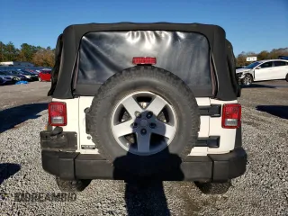 2010 Jeep Wrangler Rubicon with VIN 1J4BA6D17AL132002, listed as a Copart auction lot 83869124 with 183,507 mi miles and Salvage title. Bid and sale history available at DreamBid. Image 6.