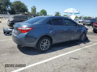 2014 Toyota Corolla L with VIN 5YFBURHE5EP014071, listed as a Copart auction lot 61442695 with 140,944 mi miles and Salvage title. Bid and sale history available at DreamBid. Image 3.