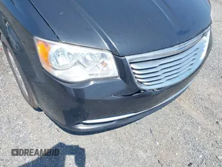 2014 Chrysler Town & Country Touring with VIN 2C4RC1BG4ER217711, listed as a IAAI auction lot 42155688 with 370,937 mi miles. Bid and sale history available at carsss.com. Image 6.