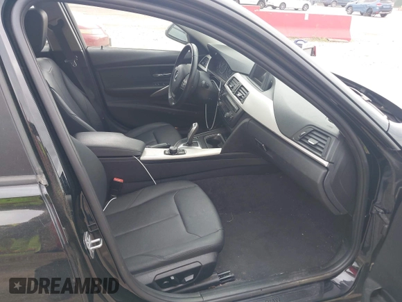 2014 BMW 3 Series 320i xDrive with VIN WBA3C3G5XENS68374, listed as a IAAI auction lot 42042243 with 107,830 mi miles. Bid and sale history available at carsss.com. Image 5.