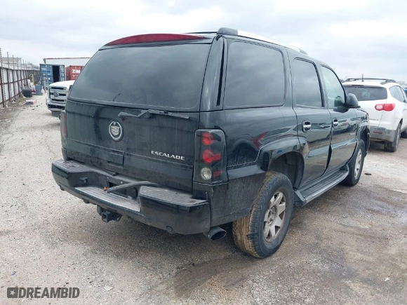 2002 Cadillac Escalade with VIN 1GYEK63N02R211749, listed as a IAAI auction lot 41462981 with 214,688 mi miles. Bid and sale history available at carsss.com. Image 4.