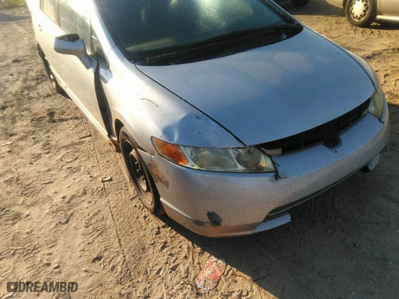 2010 Honda Civic Sdn LX with VIN 2HGFA1F57AH308880, listed as a IAAI auction lot 41893782 with 255,762 mi miles. Bid and sale history available at carsss.com. Image 6.