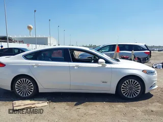 2017 Ford Fusion Titanium with VIN 3FA6P0SUXHR147336, listed as a IAAI auction lot 41873106 with 103,247 mi miles and . Bid and sale history available at DreamBid. Image 13.