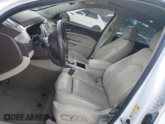 2013 Cadillac SRX Premium Collection with VIN 3GYFNEE33DS655323, listed as a Copart auction lot 47194335 with 79,612 mi miles and Salvage title. Bid and sale history available at DreamBid. Image 7.