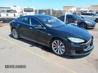 2013 Tesla Model S with VIN 5YJSA1CG0DFP17932, listed as a IAAI auction lot 42212413 with 76,214 mi miles and . Bid and sale history available at DreamBid. Image 1.