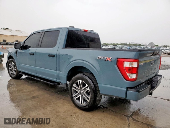 2023 Ford F-150 XL with VIN 1FTEW1CP3PKF86310, listed as a Copart auction lot 60575065 with 29,548 mi miles and Salvage title. Bid and sale history available at DreamBid. Image 2.