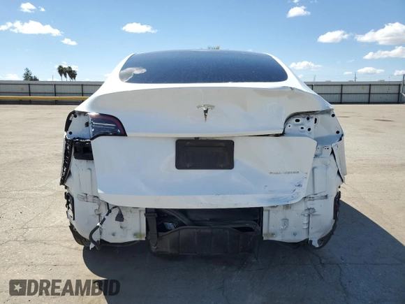 2021 Tesla Model Y Long Range z VIN 5YJYGAEE4MF267156, wystawiony jako Copart lot #50634185 z przebiegiem 72 850 mil mil oraz Szkoda całkowita • Salvage title. Historia ofert i sprzedaży dostępna na DreamBid. Obrazek 6.