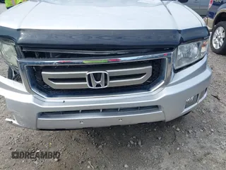 2009 Honda Ridgeline RTL with VIN 2HJYK16539H500986, listed as a IAAI auction lot 42084176 with 161,142 mi miles and . Bid and sale history available at DreamBid. Image 19.