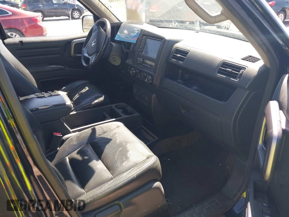 2013 Honda Ridgeline RTL with VIN 5FPYK1F57DB005538, listed as a IAAI auction lot 41985586 with 152,697 mi miles and . Bid and sale history available at DreamBid. Image 5.