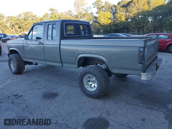 1986 Ford F-150 with VIN 1FTEX15N6GKA13863, listed as a Copart auction lot 76065584 with 203,343 mi miles and Salvage Title. Bid and sale history available at carsss.com. Image 2.