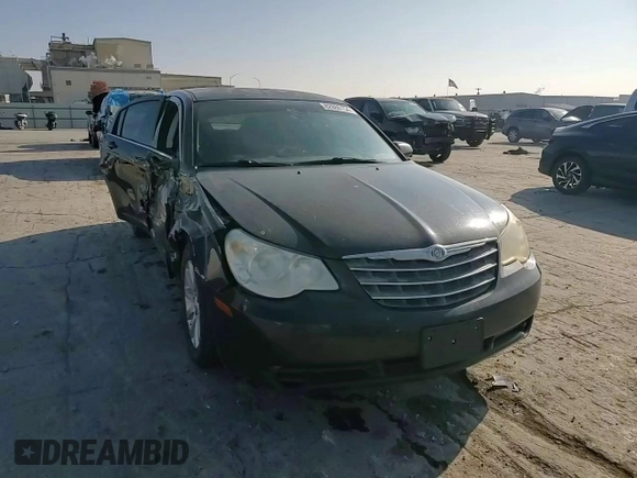 2010 Chrysler Sebring Limited with VIN 1C3CC5FBXAN108421, listed as a Copart auction lot 82886154 with 168,376 mi miles and Salvage Title. Bid and sale history available at carsss.com. Image 10.