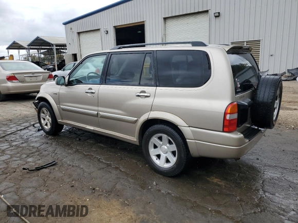 2002 Suzuki XL7 Standard z VIN JS3TY92V524101048, wystawiony jako Copart lot #77658264 z przebiegiem 226 279 mil mil oraz Szkoda całkowita • Salvage title. Historia ofert i sprzedaży dostępna na DreamBid. Obrazek 2.