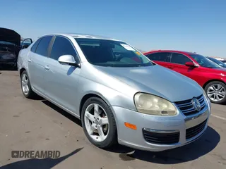 2009 Volkswagen Jetta z VIN 3VWAL71K49M135512, wystawiony jako IAAI lot #42316706 z przebiegiem 193 794 mil mil oraz . Historia ofert i sprzedaży dostępna na DreamBid. Obrazek 1.