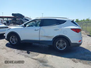 2018 Hyundai Santa Fe Sport 2.4L with VIN 5XYZU3LBXJG522477, listed as a IAAI auction lot 41981849 with 64,964 mi miles. Bid and sale history available at carsss.com. Image 14.