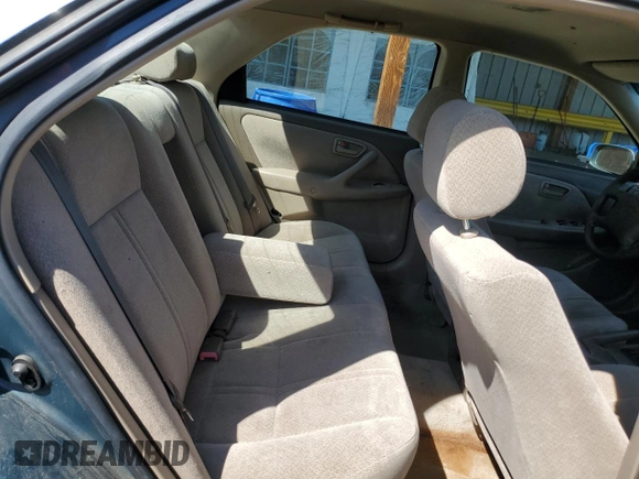 2001 Toyota Camry CE z VIN JT2BG22K410538709, wystawiony jako Copart lot #53295905 z przebiegiem 223 115 mil mil oraz Szkoda całkowita • Salvage title. Historia ofert i sprzedaży dostępna na DreamBid. Obrazek 10.