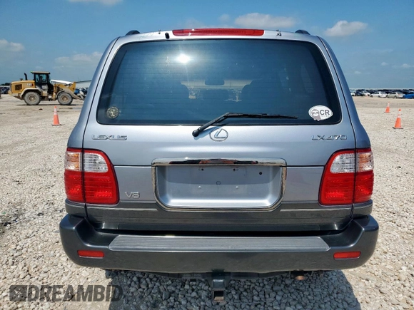 2001 Lexus LX 470 z VIN JTJHT00W313504330, wystawiony jako Copart lot #61126435 z przebiegiem 87 049 mil mil oraz Czysty tytuł • Clean title. Historia ofert i sprzedaży dostępna na DreamBid. Obrazek 6.