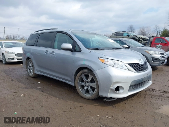 2011 Toyota Sienna SE with VIN 5TDXK3DC1BS096963, listed as a IAAI auction lot 41676328 with 168,436 mi miles. Bid and sale history available at carsss.com. Image 1.